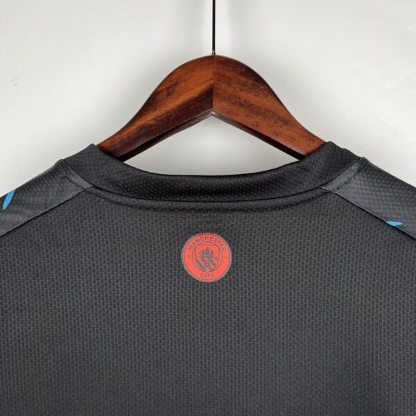 CAMISETA MANCHESTER CITY 3ª ESPECIAL EQUIPACIÓN 23/24 - Image 2